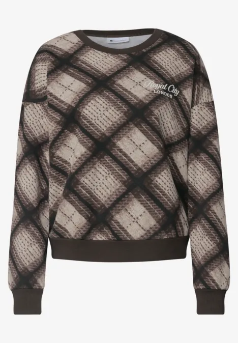 Pull beige à motif écossais noir et marron, manches longues et bord-côtes élastiques.