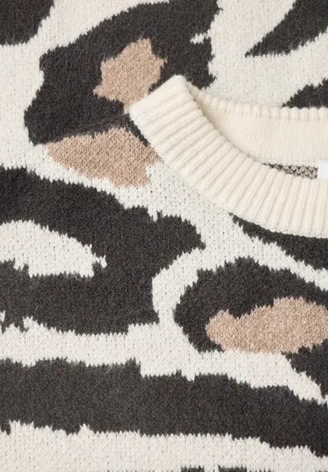 Pull tricoté à motif zèbre en crème, noir et marron