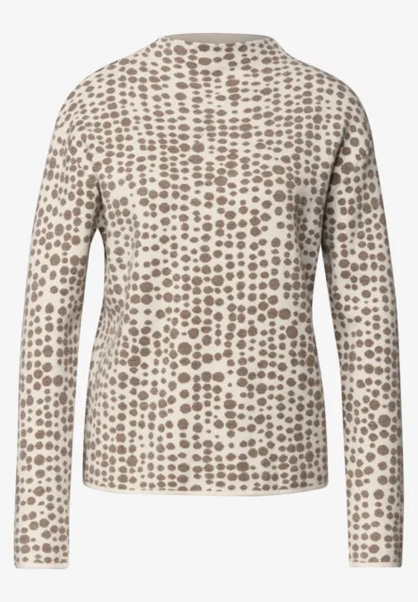 Beige Langarmshirt mit braunen Punkten, Rückansicht.