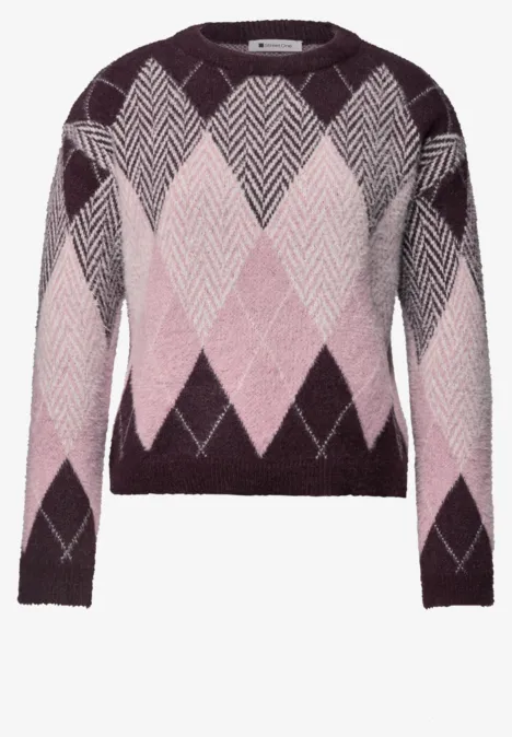 Strickpullover mit argyle Rautenmuster in Violett-, Rosa- und Weißtönen.