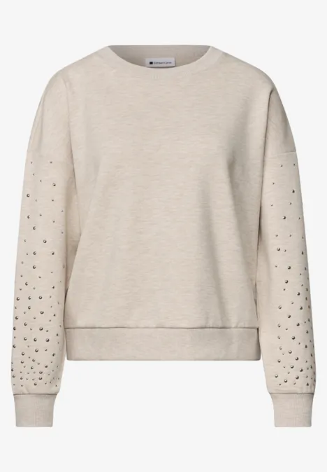 Leichter beigefarbener Pullover mit Rundhalsausschnitt und Ärmeln mit zarten Lochdetails.
