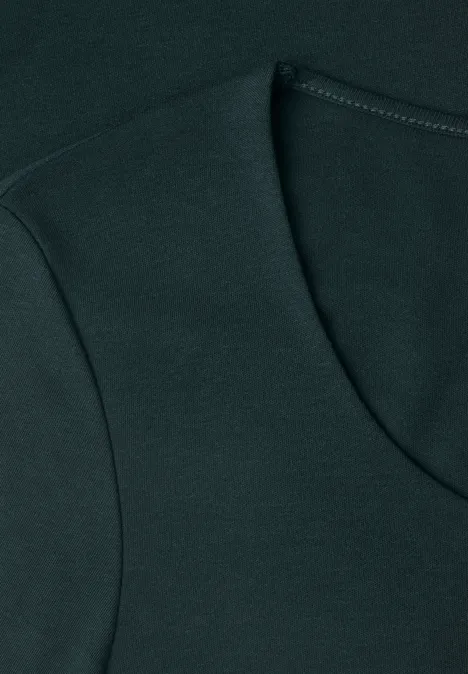 T-shirt vert foncé à col rond avec couture apparente