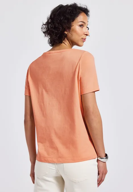 T-shirt avec un motif de film creamy orange