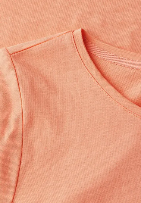 T-shirt avec un motif de film creamy orange
