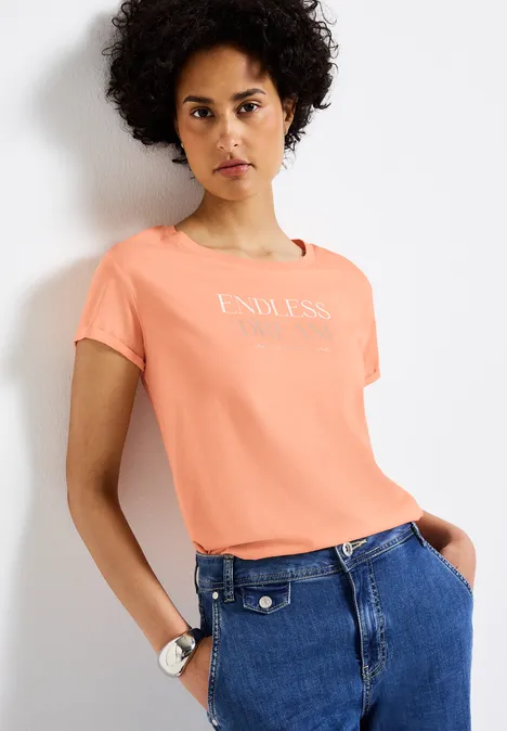 T-Shirt mit Wording creamy orange
