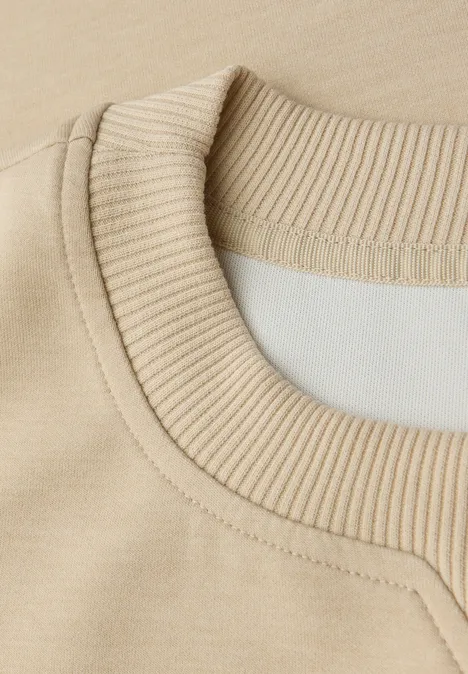 Shirt met geribd detail sanded beige mel.