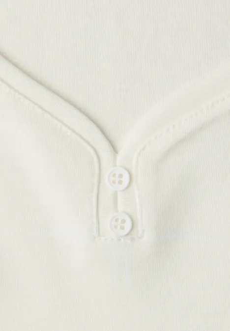 Top met knoopdetail off white Top met knoopdetail off white