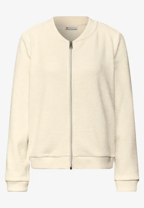 Jasje met glinsterende structuur soft beige