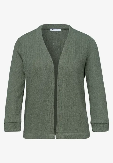Cardigan ouvert en maille vert olive, manches retroussées et design épuré.