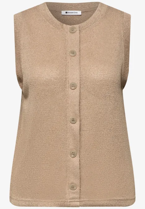 Gebreid gilet met glitter timeless beige Mouwloos gebreid beige vest met ronde hals en voorknopen.