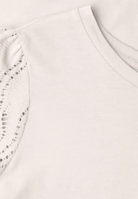 Shirt met ronde hals en kanten mouwen clay sand Lichtbeige T-shirt met ronde hals en mouwen versierd met glinsterende studs.