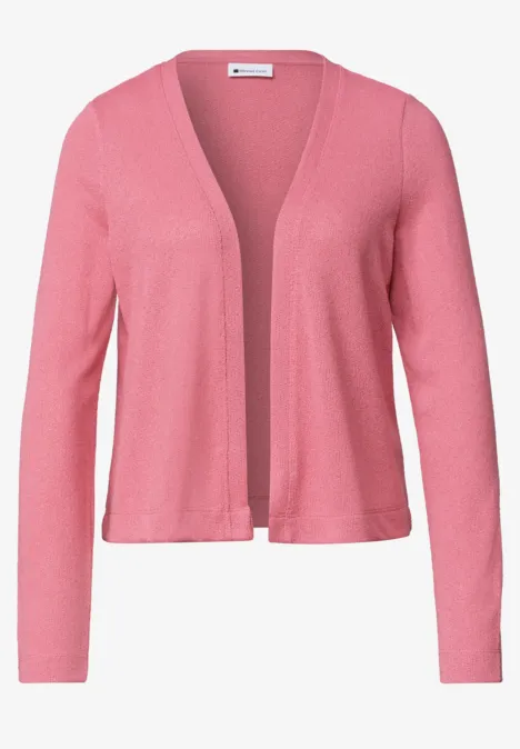 Cardigan rose pour femme, coupe ouverte, manches longues et style épuré.