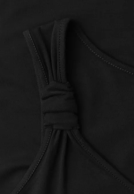 Schwarzer Bikini- oder Bustier-Oberteil mit überkreuzten Trägern und zentralem Knotendetail.