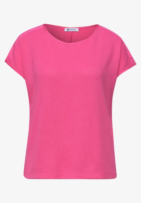 Ein schlichtes pinkes Kurzarmshirt für Damen.