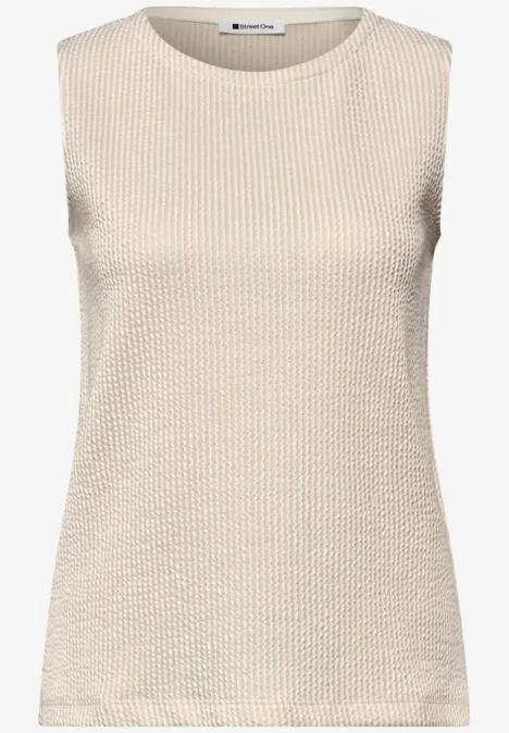 Mouwloos beige topje met fijne, gestructureerde gebreide look.