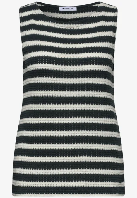 Top sans manches rayé noir et blanc en maille crochetée