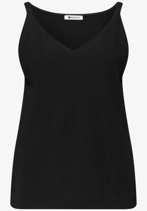 Top in structuurmix Black Zwart mouwloos topje met V-hals.