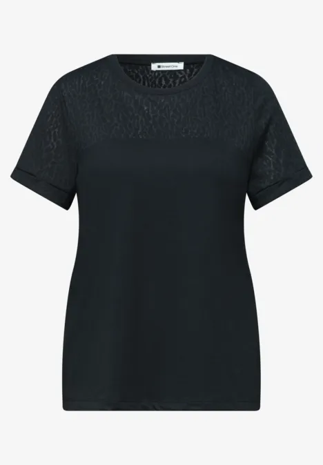 Zwart T-shirt met korte mouwen en fijne kanten motief aan de bovenkant.