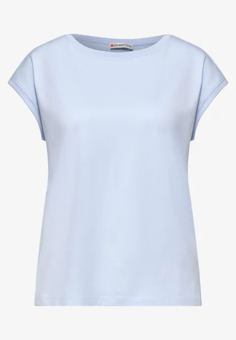 Lichtblauw T-shirt met korte mouwen en losse pasvorm.