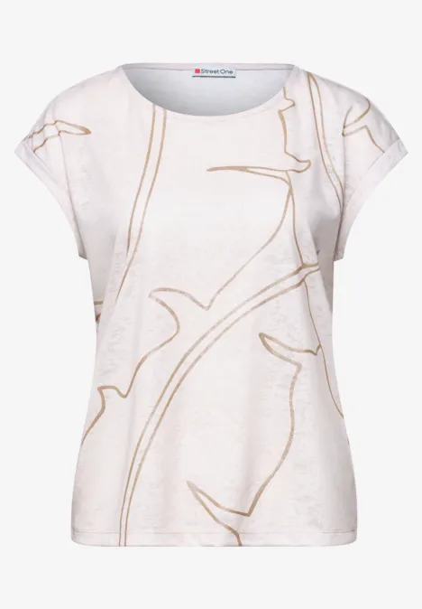 T-shirt femme blanc à manches courtes, motif beige fin rappelant des branches abstraites.