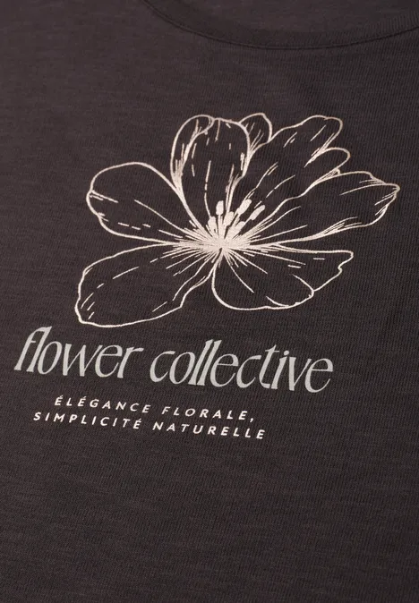 Dunkles T-Shirt mit weißer Blumenskizze und Text 'flower collective' plus 'Elegance florale, Simplicité naturelle'.