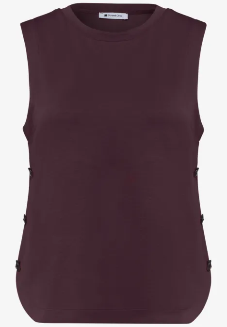 Haut sans manches femme couleur prune foncé, col rond et boutons décoratifs sur les côtés.