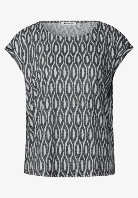 Tee-shirt femme gris à manches courtes avec motif graphique noir et blanc.