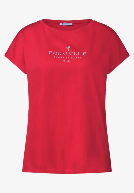 Een rood dames T-shirt met de witte tekst 'Palm Club' op de borst.