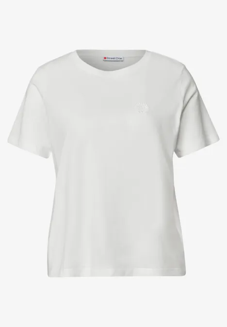Shirt met ronde hals en geborduurd detail off white Effen wit dames-T-shirt met ronde hals en korte mouwen