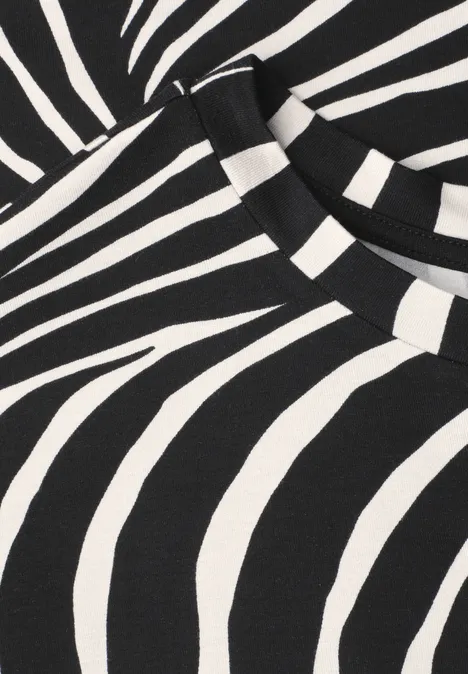 T-shirt à col rond et cordon de serrage Black Motif zébré en noir et blanc sur un haut, avec des rayures contrastées.