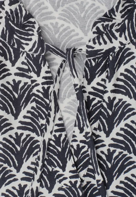 Top met verschillende texturen en gehaakte details shadowed navy Lichtgrijze hoodie met donkerblauw bladpatroon en verstelbare koordjes bij de hals.
