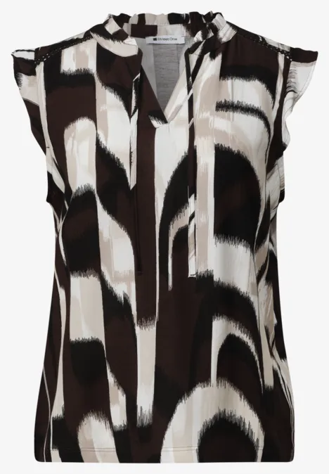 Blouse sans manches col V pour femme avec motif abstrait coups de pinceau en noir, blanc et beige.