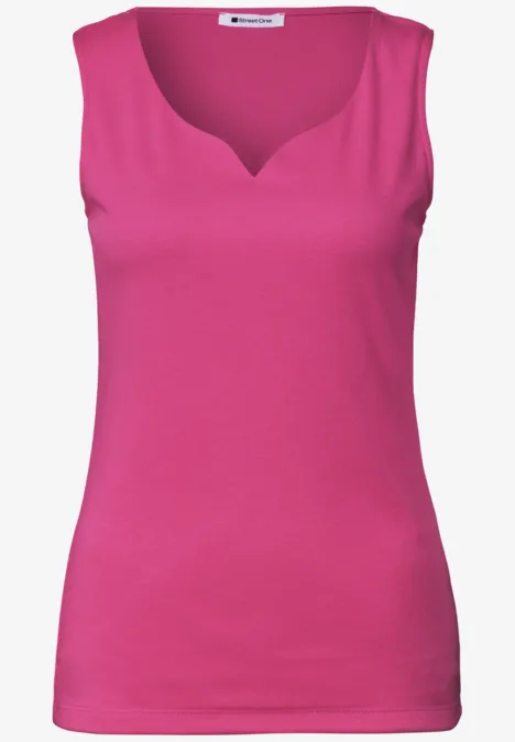 Mouwloos roze dames topje met licht afgeronde V-hals.