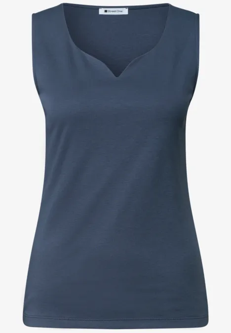 Donkerblauw mouwloos damestopje met subtiele V-hals.