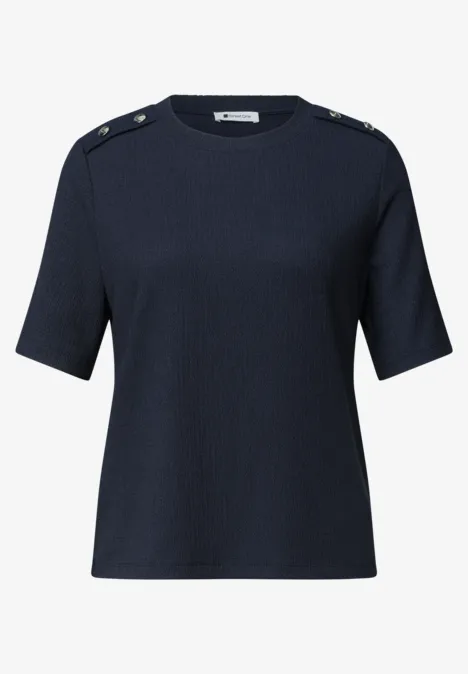 Navyblaues Kurzarm-Strickoberteil mit Schulterknöpfen.