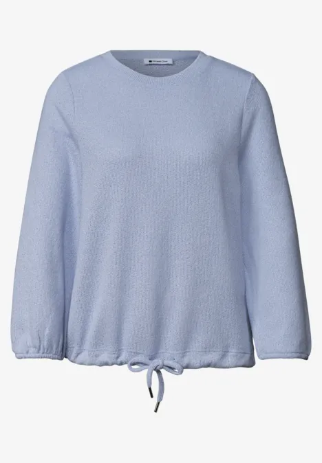 3/4-Arm Shirt mit Rundhals im Strick-Look whispery blue mel. Hellblauer Langarm-Pullover mit Rundhalsausschnitt und Kordelzug am Saum.