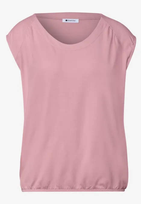 Losvallend, lichtroze T-shirt met korte mouwen, brede ronde hals en elastische zoom.