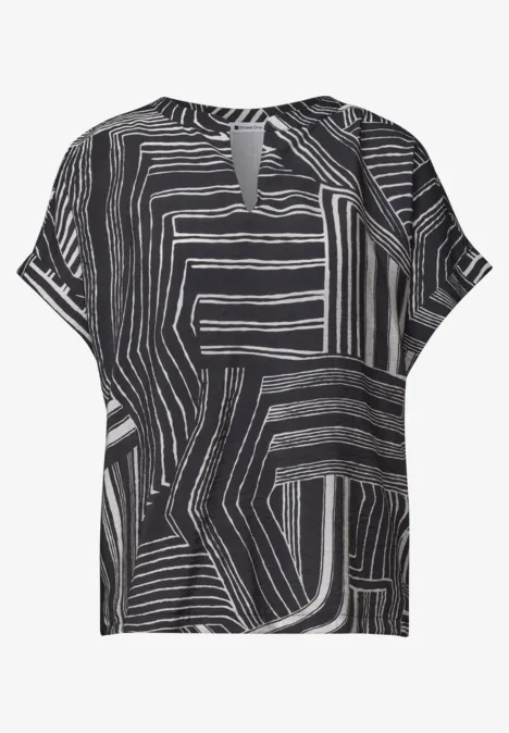 Schwarzes Damen-T-Shirt mit abstraktem weißen Linienmuster und kleinem V-Ausschnitt-Slitz.