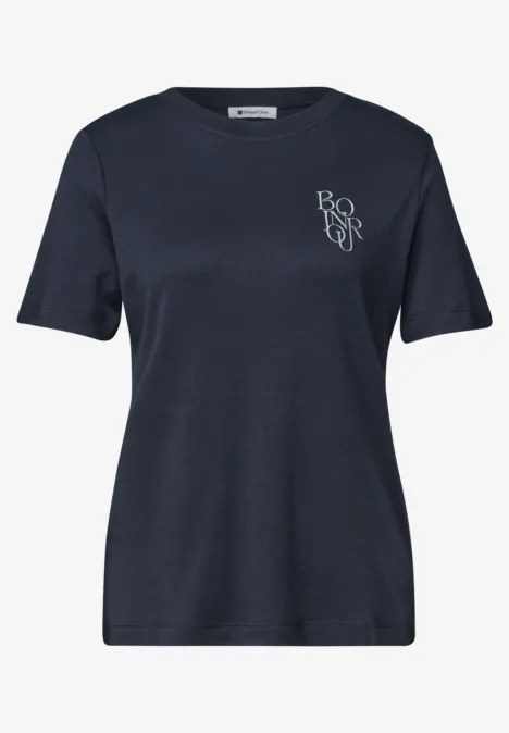 Dunkelblaues T-Shirt mit Rundhalsausschnitt und kleinem 'BORN'-Logo auf der Brust.