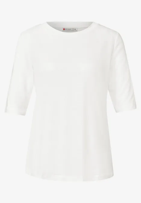 Basic T-Shirt mit Rundhals in Unifarbe off white Ein schlichtes weißes T-Shirt mit rundem Ausschnitt und halblangen Ärmeln.