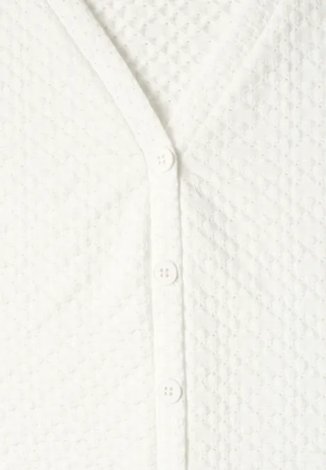 Top mit V-Neck und dekorativer Knopfleiste off white Weißer Cardigan mit Wabenmuster und Knopfleiste.