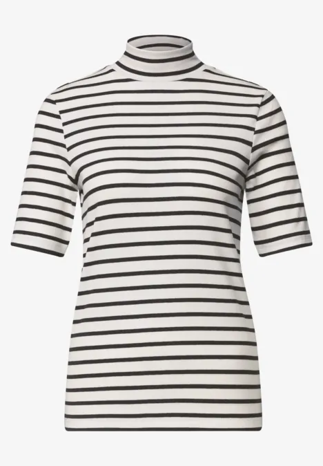 Top pour femme à manches mi-longues blanc à rayures noires avec col roulé.