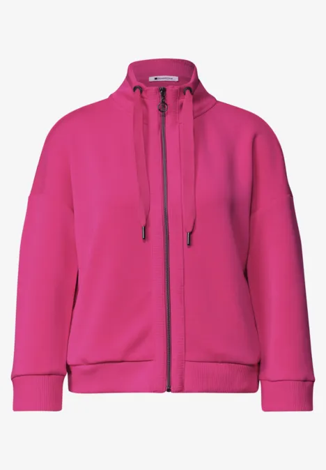 Helle pinke Kapuzenjacke mit Reißverschluss und Kängurutaschen.