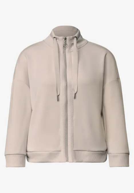 Veste en molleton beige zippée avec col montant et cordon