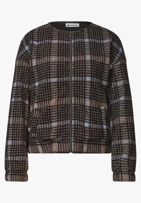 Veste droite à carreaux marron et noir avec touches bleu clair, fermeture zippée intégrale.