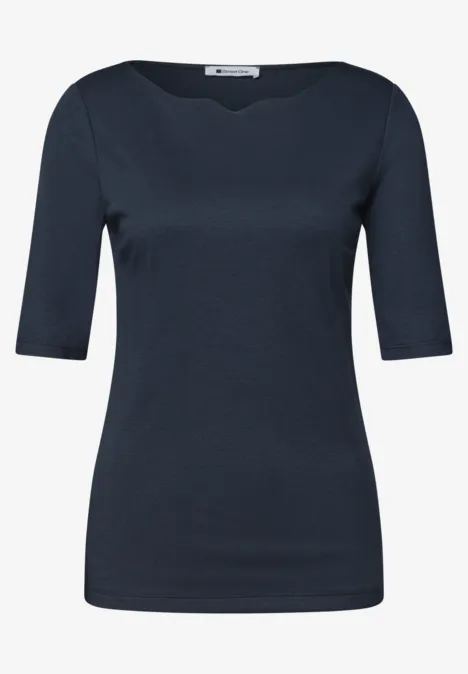 T-shirt femme bleu foncé uni, manches mi-longues et encolure ronde.