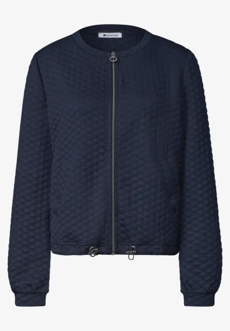 Schlichte marineblaue gesteppte Bomberjacke mit Reißverschluss, elastischen Bündchen und verstellbarem Saum.