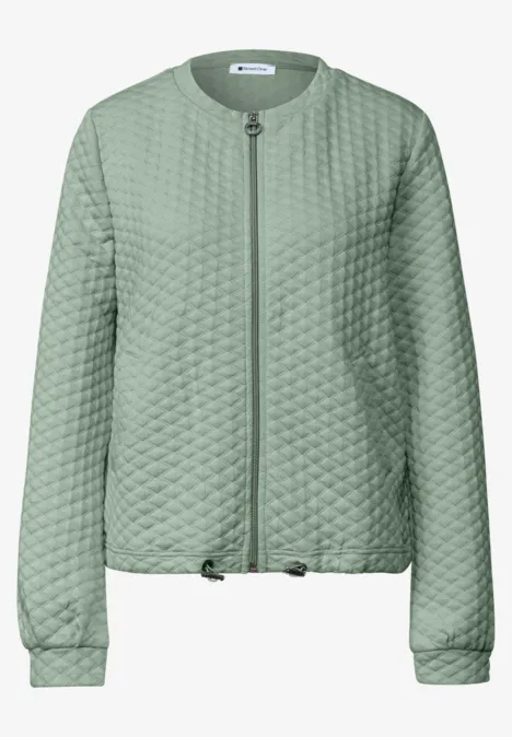 Hellgrüne, gesteppte Bomberjacke mit Reißverschluss, rundem Kragen und elastischen Bündchen.