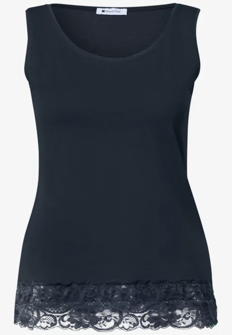 Schwarzes ärmelloses Damen-Top mit feiner Spitze am Saum.