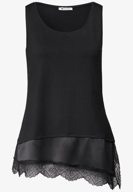 Ärmelloses schwarzes Oberteil mit Stufen-Saum aus Spitze und leichtem Chiffon